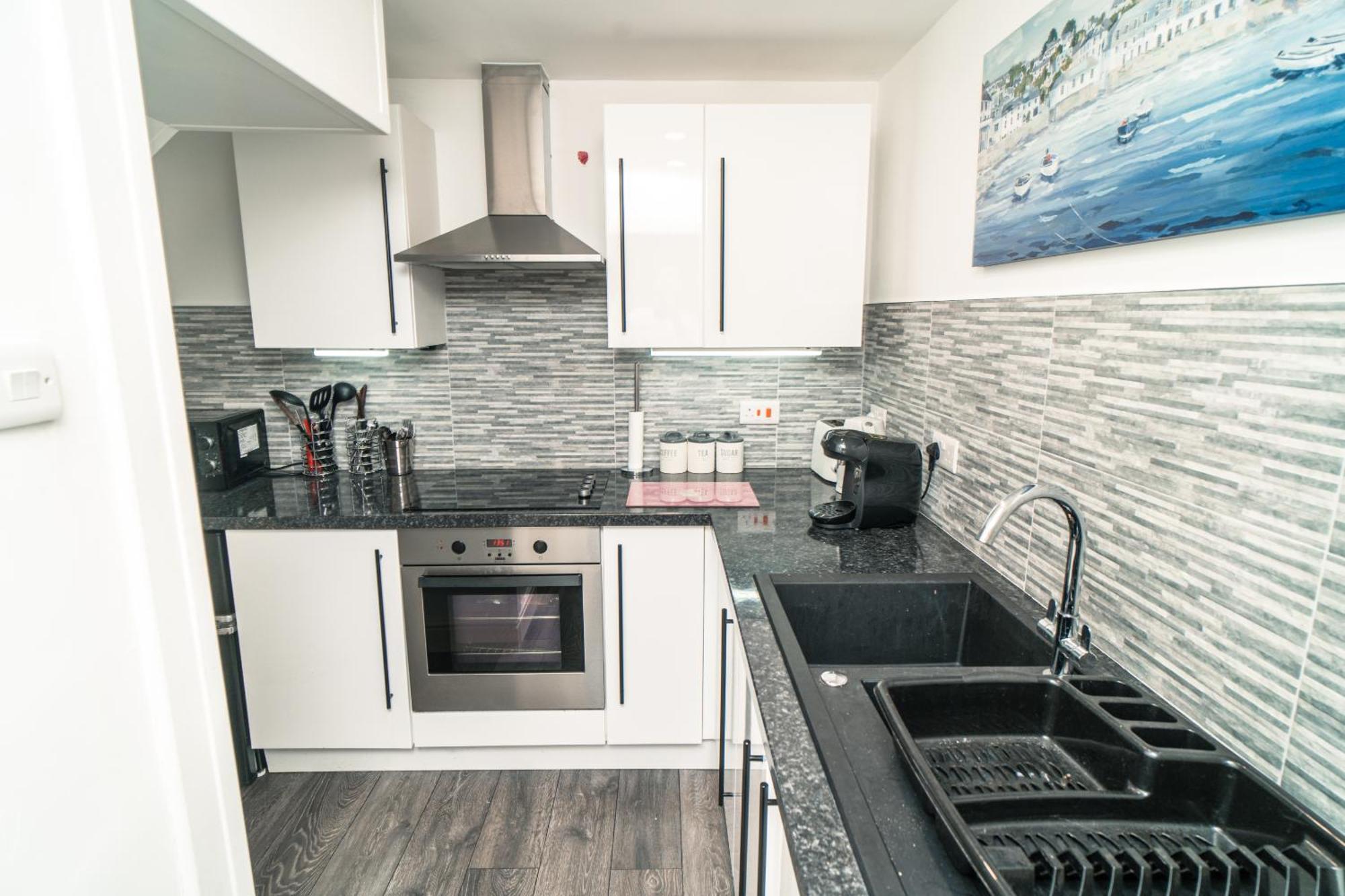 Beachmount Holiday Apartments コルウィン・ベイ 部屋 写真
